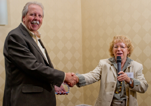 Marty Ralph accepts the DWR Climate Science Service Award from Jeanine Jones, Interstate Resources Manager for DWR.